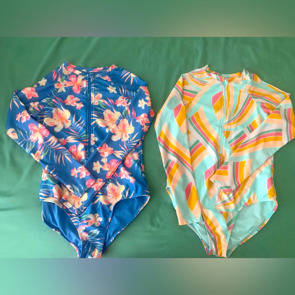 Two Wonder nation long sleeve one piece swim suits size (XL) 14-16